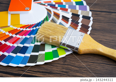 Color palette guide catalog with brush tools for paint house. Color palette guide catalog with brush tools for paint house. 143244311