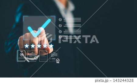 Businessman touching digital screen with check mark, five stars rating, and checklist icons. Concept of quality assurance, customer satisfaction, business review, evaluation, and compliance 143244328
