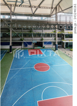 Modern Covered Campus Basketball Court and Architectural Athletics Space, Contemporary School Sports Pavilion with Vibrant All-Weather Courts. 143246161