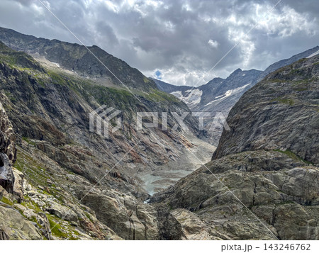 Glacial valley of Tre-La-Tete with rocky cliffs in Les Contamines-Montjoie, France Glacial valley of Tre-La-Tete with rocky cliffs in Les Contamines-Montjoie, France 143246762