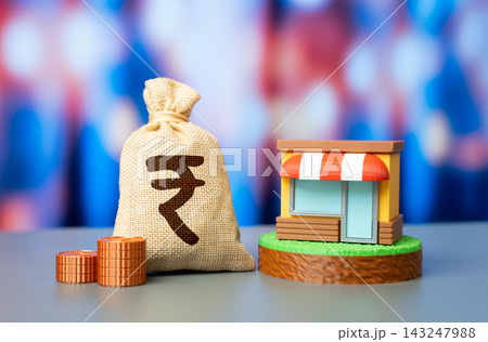 A store and indian rupee money bag represent business income and profit. Retail investments and funding. Grants, subsidies, and financial support help small businesses grow and succeed. A store and indian rupee money bag represent business income and profit. Retail investments and funding. Grants, subsidies, and financial support help small businesses grow and succeed. 143247988