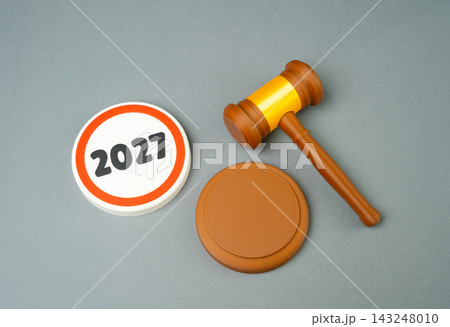 Postponing the enforcement of a law or verdict until the end of 2027. Legal restrictions until 2027. Delayed enforcement, regulatory compliance and legal deadlines. 143248010