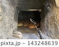 Traditional Bread Baking in Rustic Stone Oven. Traditional Bread Baking in Rustic Stone Oven. 143248639