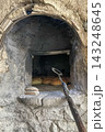 Traditional Bread Baking in Rustic Stone Oven. Traditional Bread Baking in Rustic Stone Oven. 143248645