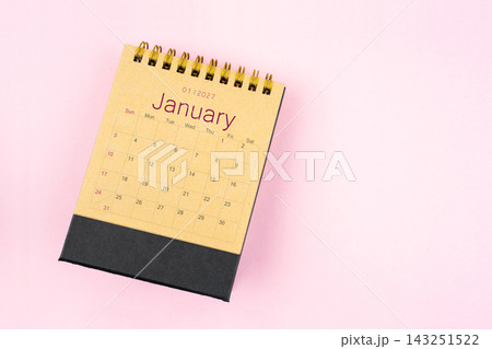 Brown calendar for January 2027 on pink background, Planning concept. 143251522
