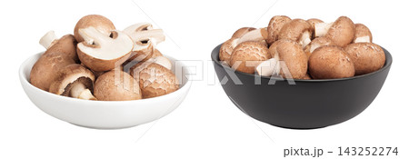 Brown champignon mushroom in a ceramic bowl isolated on white background 143252274