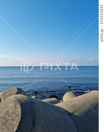 The blue Jeju sea with a breakwater. The blue Jeju sea with a breakwater. 143253835