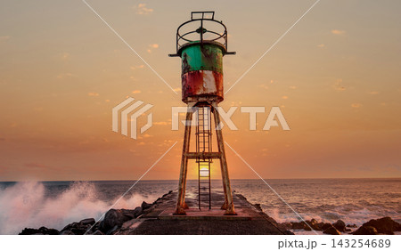 Jetty and lighthouse in Saint-Pierre, La Reunion island Jetty and lighthouse in Saint-Pierre, La Reunion island 143254689
