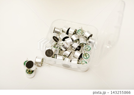 Iron microphones in a box. Small microphones. Microphones in electronics. 143255866