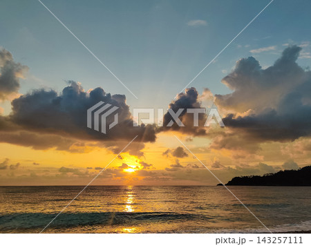 beautiful dramatic landscape of sunset on the sea beach 143257111