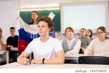 Young boy student studying diligently at school 143259679