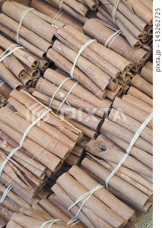 There are numerous bundles of cinnamon sticks available for purchase in the market There are numerous bundles of cinnamon sticks available for purchase in the market 143262725
