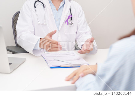 Doctor and patient having a medical consultation for purple ribbon for concept of Violence, Pancreatic, Esophageal, Testicular cancer, Alzheimer, Epilepsy, Lupus and Fibromyalgia. Awareness month 143263144