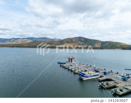 Aerial view Otay Lakes County Park in Chula Vista, California, a scenic view of a mountain range 143263607