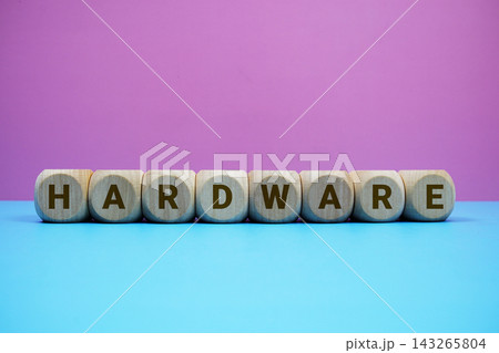 HARDWARE alphabet letters wooden cube with alarm clock on pink and blue background HARDWARE alphabet letters wooden cube with alarm clock on pink and blue background 143265804