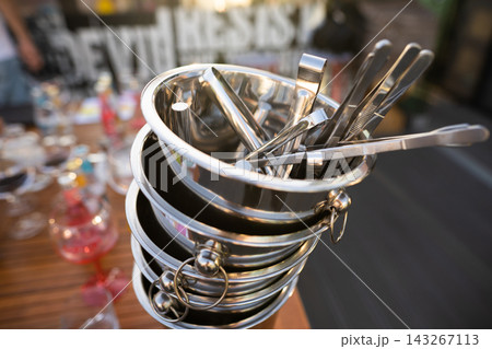 metal ice bucket on bar counter with ice scoop tool metal ice bucket on bar counter with ice scoop tool 143267113
