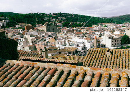 Panoramic rooftops of Tossa de Mar old town on Costa Brava in Spain. Mediterranean travel destination for cultural tourism walking tours and authentic Catalonia atmosphere 143268347