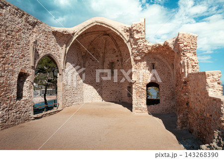 Medieval monastery ruins inside Vila Vella fortress in Tossa de Mar Spain. Historic Costa Brava landmark for castle tours Gothic architecture heritage travel and Catalan history 143268390