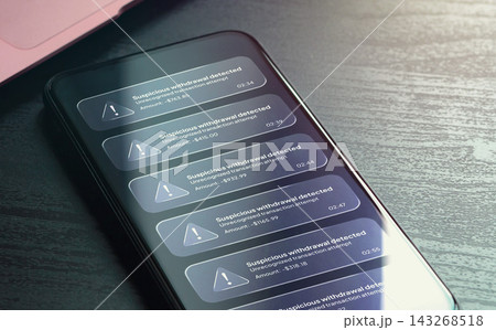 Suspicious withdrawal alerts on smartphone screen showing unauthorized banking transactions. Financial fraud detection, account protection and cybercrime concept Suspicious withdrawal alerts on smartphone screen showing unauthorized banking transactions. Financial fraud detection, account protection and cybercrime concept 143268518