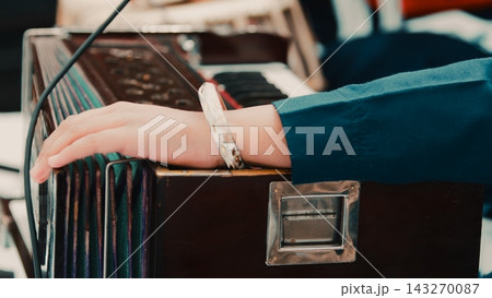 Indian plays Sikh prayer music with harmonium keyboard during Vaisakhi 143270087