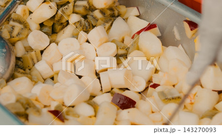 Fruit salad with bananas, peaches and kiwi served during Vaisakhi celebration Fruit salad with bananas, peaches and kiwi served during Vaisakhi celebration 143270093