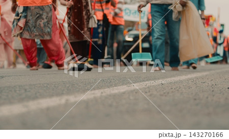 Indian Vaisakhi religious procession crowd people passes and street cleaning Indian Vaisakhi religious procession crowd people passes and street cleaning 143270166