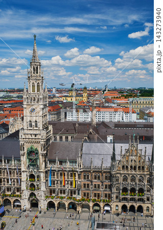 Vertical high angle shot of the ornate Neues Rathaus gothic tower on Marienplatz in Munich, Bavaria, Germany during daytime. 143273940