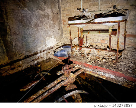 Sink in WC toilet in dark underground bunker Sink in WC toilet in dark underground bunker 143278857