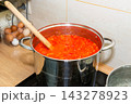 Tomato sauce in big cooking pot 143278923