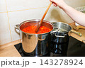 Cooking tomato sauce in big cooking pot 143278924