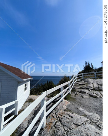 White fence on rocky coast, Tadoussac White fence on rocky coast, Tadoussac 143279359
