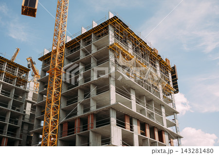High rise building under construction with tower crane 143281480