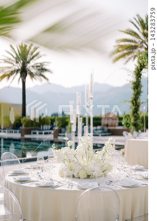 Elegant wedding dinner setup at Porto Montenegro Yacht Club 143283759