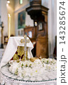 Religious Ceremony Setting. Decorative Religious Altar Featuring Flowers And Candles In Church 143285674
