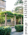 Bright Garden Scene With Elegant Fencing. Peaceful Mediterranean Yard With Shaded Plants 143285678