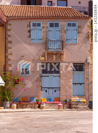Traditional House Facade with Blue Shutters in Chania, Crete, Greece Traditional House Facade with Blue Shutters in Chania, Crete, Greece 143288694