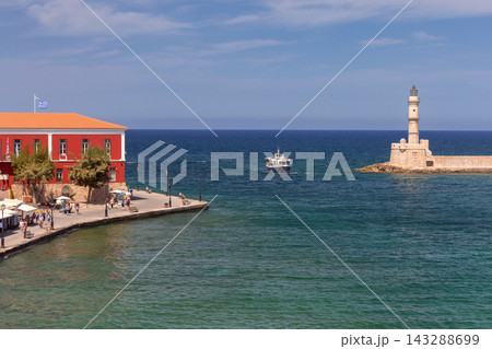 Chania Old Venetian Harbor and Lighthouse in Crete, Greece 143288699