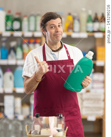 Man seller advertises liquid detergent 143290216