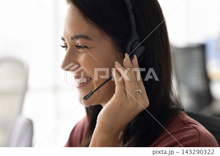 Customer services agent providing professional assistance remotely, close up Customer services agent providing professional assistance remotely, close up 143290322