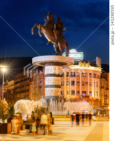 Square Macedonia in Skopje at sunset with dancing illuminated fountains and statue of Alexander Great at background Square Macedonia in Skopje at sunset with dancing illuminated fountains and statue of Alexander Great at background 143290595