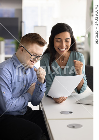 Happy diverse teammates, celebrating joint success, equal opportunities in office Happy diverse teammates, celebrating joint success, equal opportunities in office 143291041