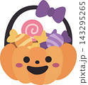 Cute Halloween Pumpkin Basket Filled with Candies and Sweets Cute Halloween Pumpkin Basket Filled with Candies and Sweets 143295265