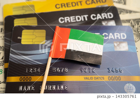 United Arab Emirates flag on credit card, finance economy trading shopping online business. United Arab Emirates flag on credit card, finance economy trading shopping online business. 143305761