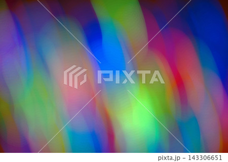 Abstract rainbow background with bokeh effect on a dark background. Christmas background with multicolored blurred lights. Abstract rainbow background with bokeh effect on a dark background. Christmas background with multicolored blurred lights. 143306651
