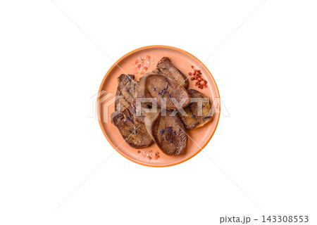 Slices of grilled pork or beef tongue seasoned with salt and allspice. Sliced beef tongue Slices of grilled pork or beef tongue seasoned with salt and allspice. Sliced beef tongue 143308553