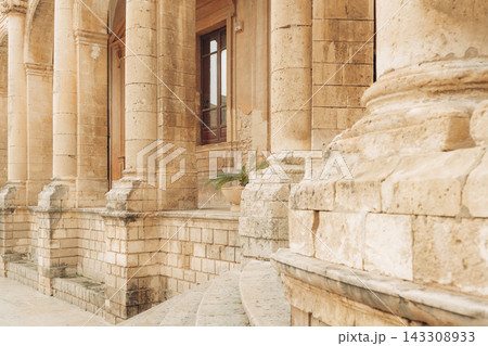 Noto Sicily Baroque architecture. Historic buildings showcase ornate facade. Noto Sicily Baroque architecture. Historic buildings showcase ornate facade. 143308933