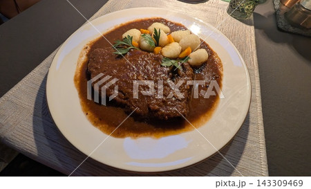 Traditional croatian pasticada beef stew with potato gnocchi Traditional croatian pasticada beef stew with potato gnocchi 143309469
