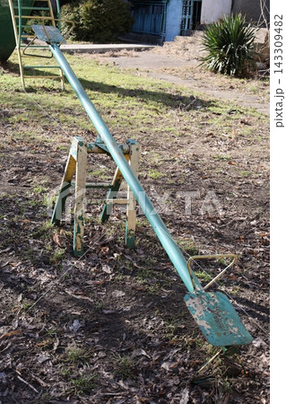 Rusty green seesaw. High quality photo Rusty green seesaw. High quality photo 143309482