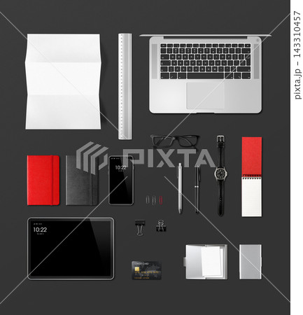 Modern Office Desk Flat Lay with Laptop, Stationery, and Gadgets Modern Office Desk Flat Lay with Laptop, Stationery, and Gadgets 143310457