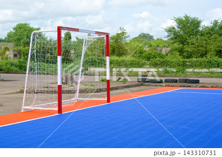 Outdoor Futsal Goal on Blue Sports Court Outdoor Futsal Goal on Blue Sports Court 143310731